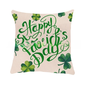 Macro detail of linen St. Patrick's Day pillow case with green clover pattern and text