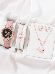 Pink butterfly watch set with matching necklace, bracelet, and earrings on white silk