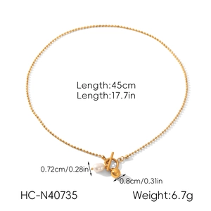 Detail view of OT buckle gold pearl necklace with dimensions and specifications