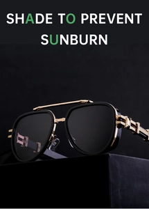 Detail of vintage aviator sunglasses with gold double bridge on a premium black stand