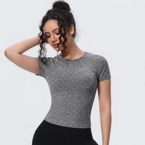 Close-up of heather grey yoga shirt showing breathable fabric texture and slim fit design
