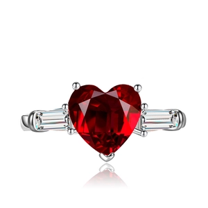 Luxurious silver heart-shaped pink zircon ring with sparkling side baguette gemstones