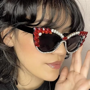 Fashionable cat eye sunglasses with red and white rhinestones on black frames for women