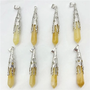 Detail of eight citrine hexagonal crystal pendants with silver metal caps and loops