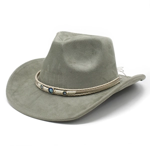 Detail of sage green faux suede cowboy hat with evil eye beaded woven band