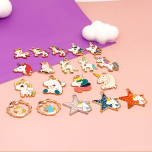 Detailed view of colorful enamel unicorn charms with gold alloy frames for DIY jewelry making