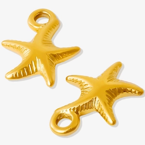 Macro shot of two textured gold starfish pendants in 304 stainless steel for DIY jewelry
