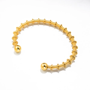 Vintage 18K gold-plated stainless steel spring cuff bracelet with spiral texture