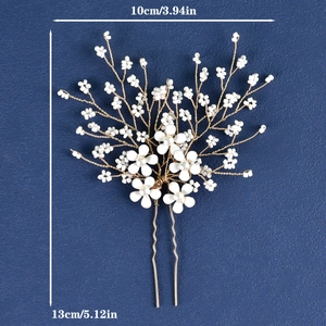 Detailed view of handmade white flower U-shaped bridal hair pin with size markers