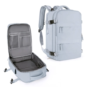 Detailed interior of a grey backpack showing multiple compartments and mesh pockets
