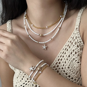 Bohemian multilayer seed bead necklace and bracelet set with starfish and shell charms
