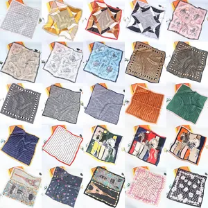 Collection of 25 satin square scarves with various artistic patterns and elegant designs