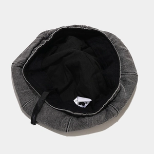 Grey denim beret hat with adjustable inner strap and breathable black lining