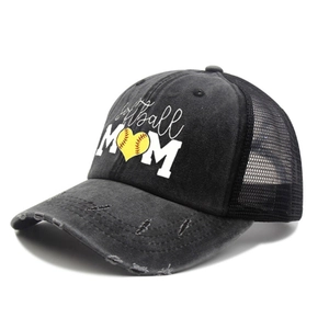Close-up of distressed black softball mom trucker hat with worn brim and mesh back