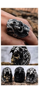 Detailed side view of gothic skull ring with tribal carvings and vintage silver finish