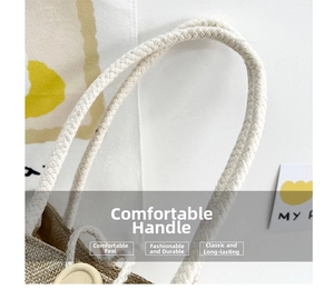 Detail of sturdy braided rope handles on a natural jute fashion tote bag for women