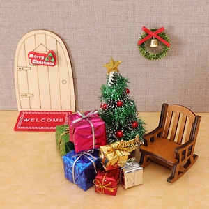 Miniature Christmas wooden door scene set with small tree and gift box decor
