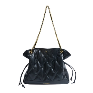 Quilted black chain shoulder bag with drawstring closure and large capacity design