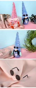 Close-up of wedding faceless gnomes with sequins hats and miniature sunglasses