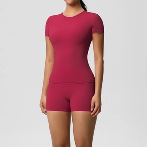 Front view of rose red high-stretch fitness yoga set featuring slim fit T-shirt and shorts