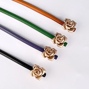 Slim genuine leather belts for women with gold floral buckles in four vibrant colors