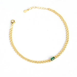 Luxurious gold-plated S925 silver curb chain bracelet with emerald green gemstone centerpiece