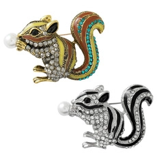 Detailed macro of squirrel brooch with colorful rhinestones and white imitation pearl