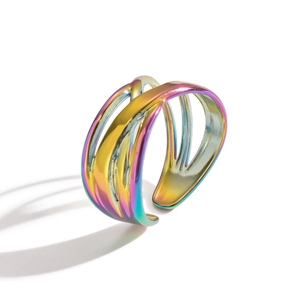 Detailed shot of iridescent geometric镂空 stainless steel ring with a wide open design