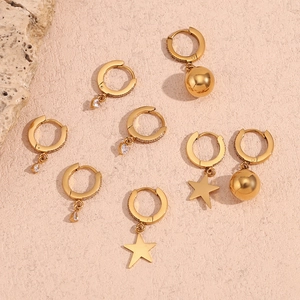 Detailed set of 18K gold plated hoop earrings featuring star and cubic zirconia charms