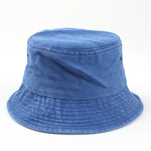 Close-up of high-quality washed cotton fabric and neat stitching on a blue bucket hat