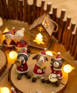 Detailed Christmas resin animals band on wood base with festive light decorations