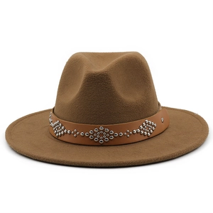 Close-up of brown wool fedora hat featuring a leather band with silver metal studs