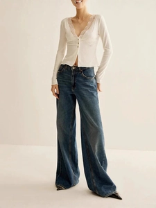 Slim fit white V-neck long sleeve top with lace trim and high waist wide leg jeans