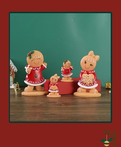 Close-up of four resin gingerbread figurines with candy canes for Christmas decor