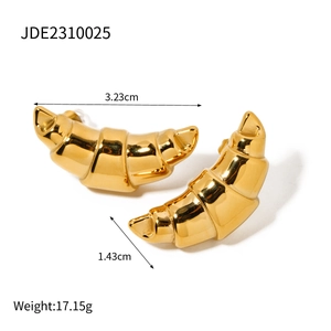 Detail view of 18k gold stainless steel croissant hoop earrings with size and weight specs