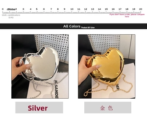 Detail of heart-shaped mini bags in silver and gold finishes with beaded chain straps