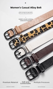 Detail view of various women's leather belts including leopard print and solid color options