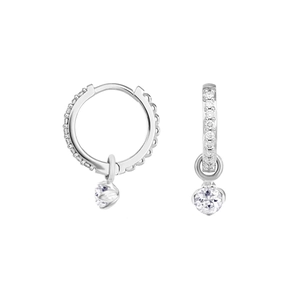 Detail of silver hoop earrings with clear cubic zirconia drop pendants on white background