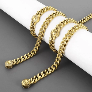 Detailed close-up of a gold stainless steel Cuban chain clasp with CNC diamond inlay details
