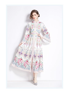Detailed full body shot of white ethnic dress with floral print and bell sleeves