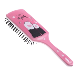 Detailed view of the pink air cushion hairbrush featuring a cute cat paw and Love Mom text