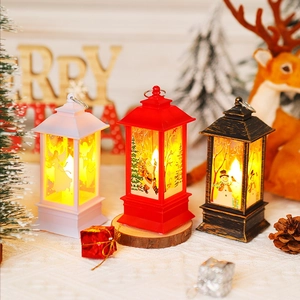 Detailed view of LED Christmas lanterns with Santa and snowman prints in three colors