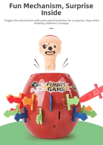 Detail view of pirate barrel toy jumping action with colorful plastic swords and funny game text