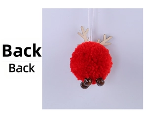 Detail of red plush Christmas reindeer ornament with wooden antlers and beads