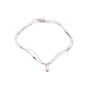 Minimalist silver double-layered necklace with a water drop pendant on a white background