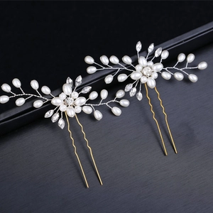 Handmade bridal hair pins with white pearls and crystals on golden U-shaped wire