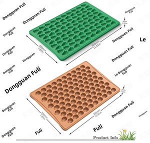 Detail of 300x200mm silicone molds for baking Christmas trees and flower patterns