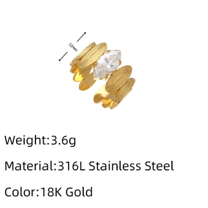 Detail of 18K gold stainless steel ring featuring marquise zircon and 12mm width specs