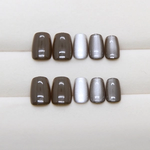 Retro brown cat eye press-on nails with metallic shimmer in a square short shape