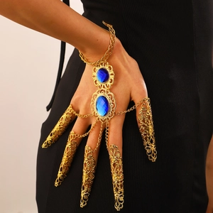 Bracciale a mano vintage dorato con pietre blu e anelli per unghie filigranati